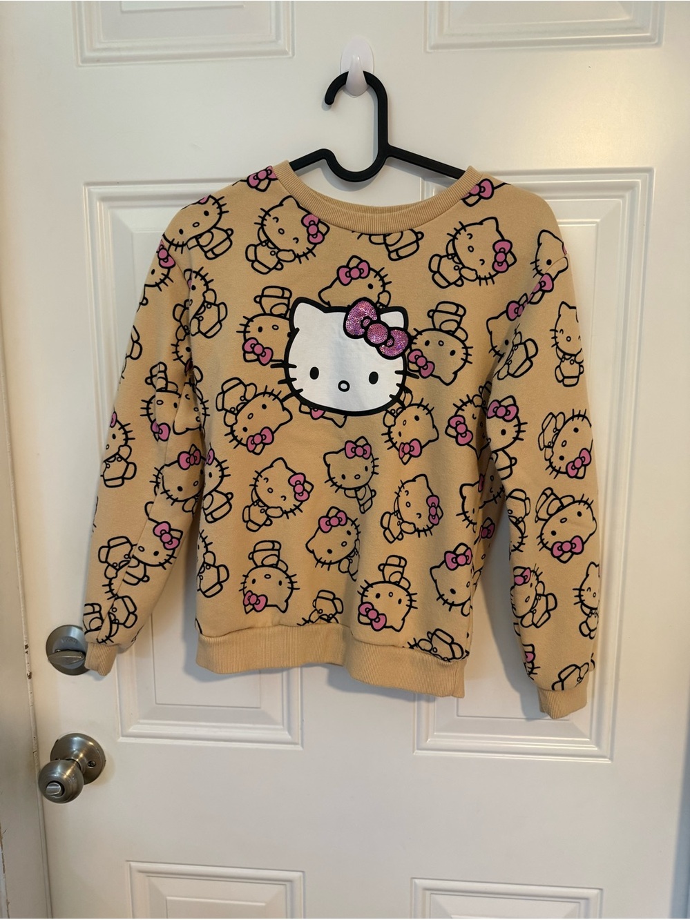 Hello Kitty Tan Crewneck Sweater with Pink Bow Accents